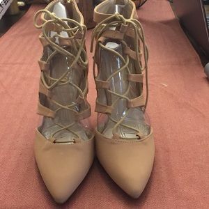 Nude lace up high heels